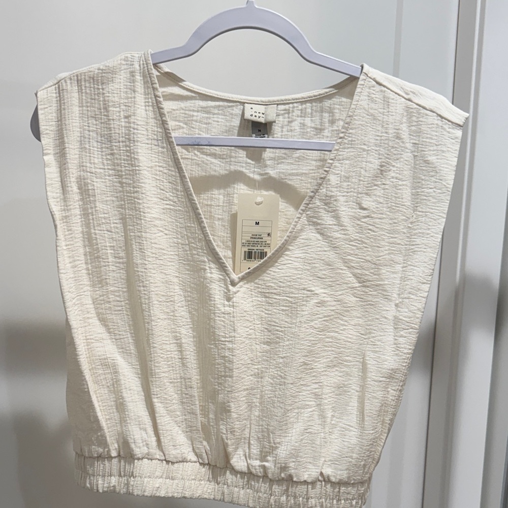 A New Day Cream Textured V-Neck Blouse